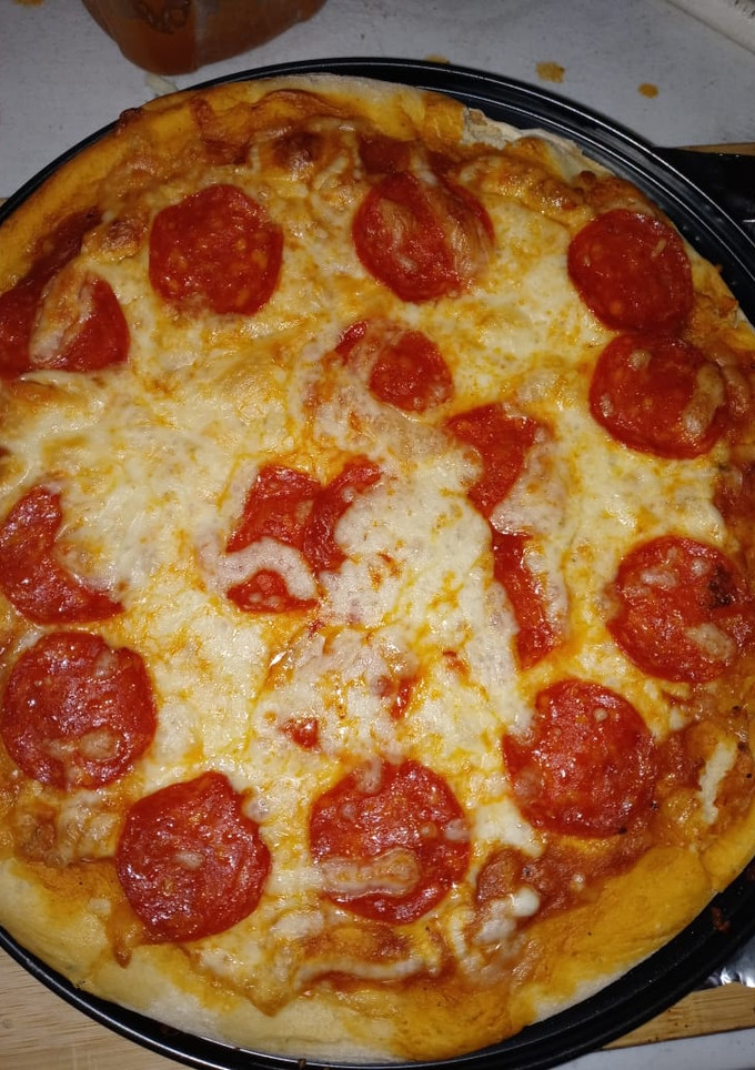 Una foto de Pizza de pepperoni "la espera"