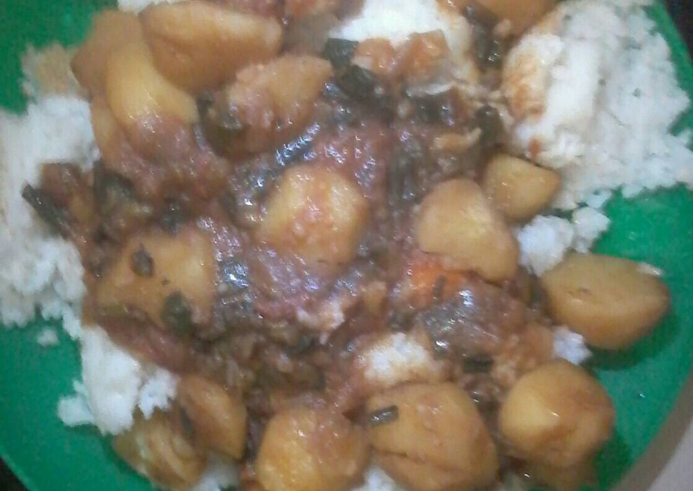 Stewed Irish potatoes served with plain rice