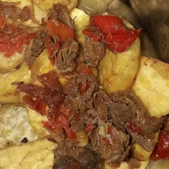 A picture of Fried Sweet potatoes nd meat sauce.
