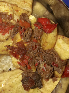 A picture of Fried Sweet potatoes nd meat sauce.