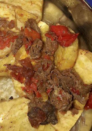 A picture of Fried Sweet potatoes nd meat sauce.