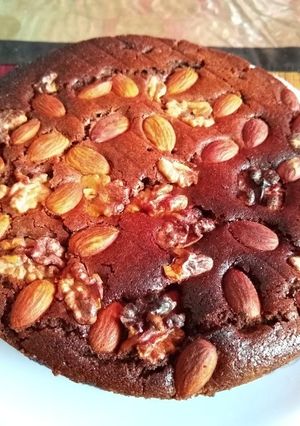 A picture of Eggless chocolate Walnut almond cake.