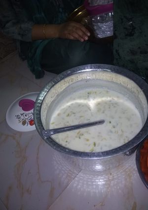 A picture of Kheer with dry fruits and rice.