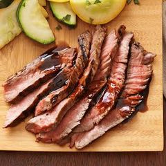 A picture of Sirloin Steak with Deep Red Wine Reduction.