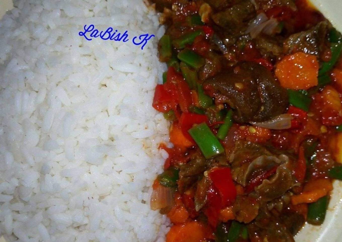Rice with stir fry goat meat sauce