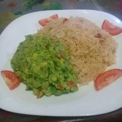 A picture of Fried rice and Guacamole.