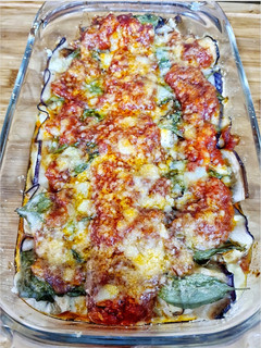 Una foto de Canelones de berenjena rellenos de queso feta y ricotta
