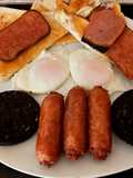My filling Breakfast, Bacon Grill, Black pudding sausage + Eggs