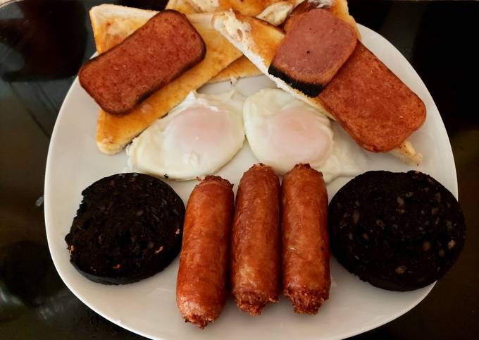 My filling Breakfast, Bacon Grill, Black pudding sausage + Eggs