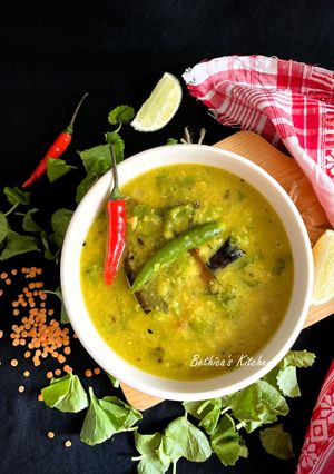 A picture of Thankuni Pata Diye Musurir Dal (Centella Leaves Cooked with Red Lentils - Bong Style).
