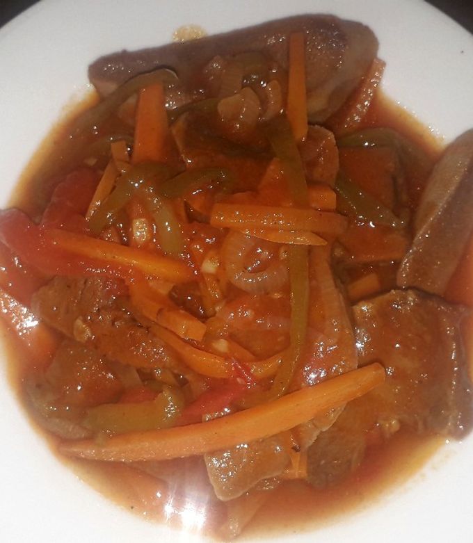 Una foto de Lengua en salsa 🍅