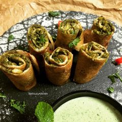 Palak Paneer Dosa Roll A picture of Palak Paneer Dosa Roll.