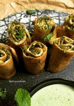 A picture of Palak Paneer Dosa Roll.