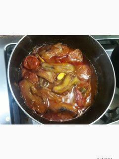 عکسی از دستور خورشت گوجه بادمجان 😋😋