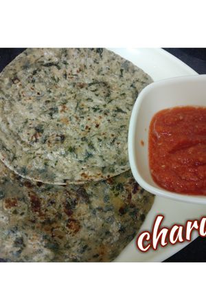 A picture of Bathue ke paratha tomato garlic chutney.