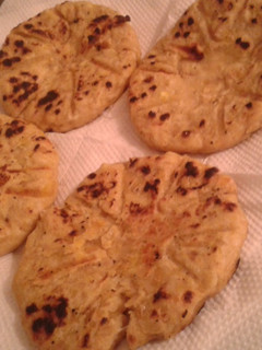 Una foto de Arepas de plátano Harton verde con queso
