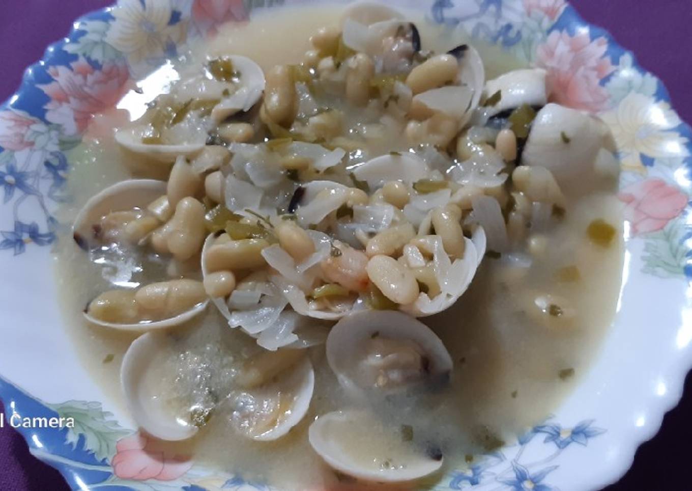 Verdinas con gambas y almejas