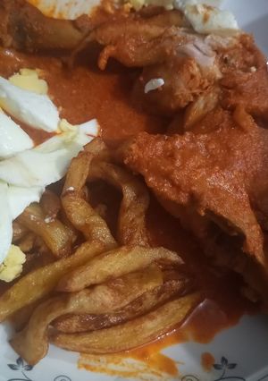 A picture of Chicken Tikka masala.