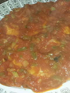 Una foto de Bacalao con pisto