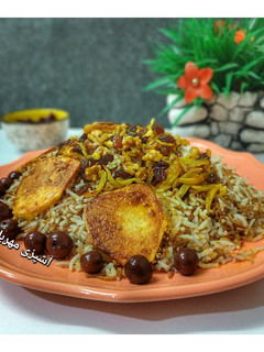 عکسی از دستور رشته پلو با کشمش و گردو