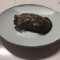 A picture of Strip Loin with Gyoza Sauce.