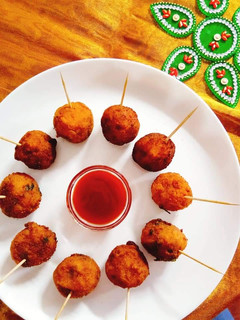 பப்பாளி காய் லாலிபாப்(raw papaya lollipop recipe in tamil) செய்முறை முக்கிய புகைப்படம்