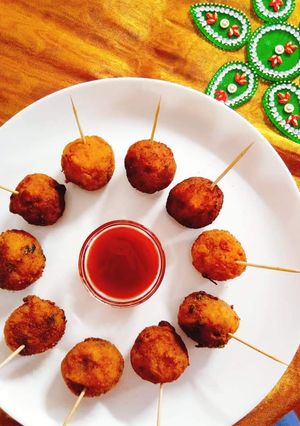 பப்பாளி காய் லாலிபாப்(raw papaya lollipop recipe in tamil) செய்முறை முக்கிய புகைப்படம்