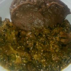 A picture of Amala and okro soup.