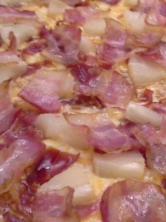 Una foto de Pizza tropical con 5 quesos