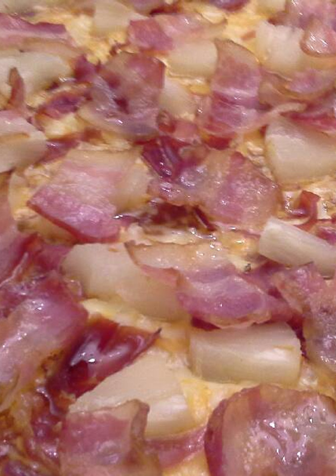 Una foto de Pizza tropical con 5 quesos