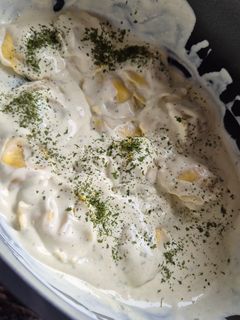 Une photo de Raviolis frais au chèvre et miel 🍯 avec sa sauce ails et fines herbes
