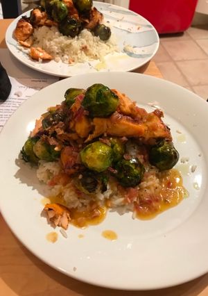 A picture of Charred salmon and sprouts.