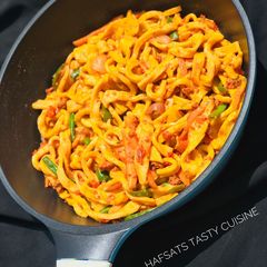 A picture of Fettuccine Bolognese.