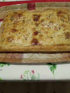 Una foto de Empanada de jamón y queso