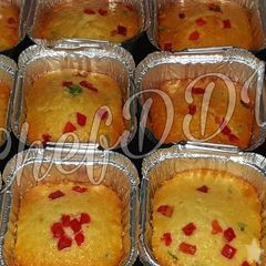 A picture of Christmas dry fruit tutti fruity cup cakes.
