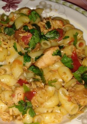 A picture of Spicy Karahi Macroni (with leftover Karahi).