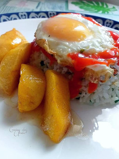 Una foto de Arroz bomba tipo cubana con manzana a la Canela y miel