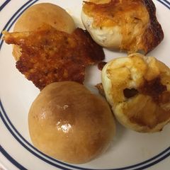 Pizza BombsPizza dough filled with cheese and pizza sauce in round shape A picture of Pizza BombsPizza dough filled with cheese and pizza sauce in round shape.