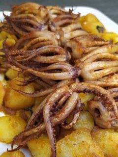 Una foto de Rejos cocidos y salteados con patatas
