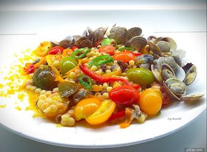 Foto di Fregola sarda con telline e bottarga