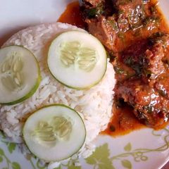 A picture of Rice and moringa stew.