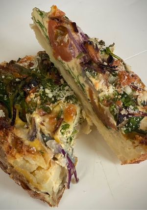 A picture of Cheese & Onion Smashed Patata Pie.