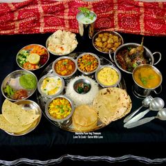 A picture of Traditional Gujarati Satvik Lunch Thali (festive and complete meal)- Garvi Gujarat.