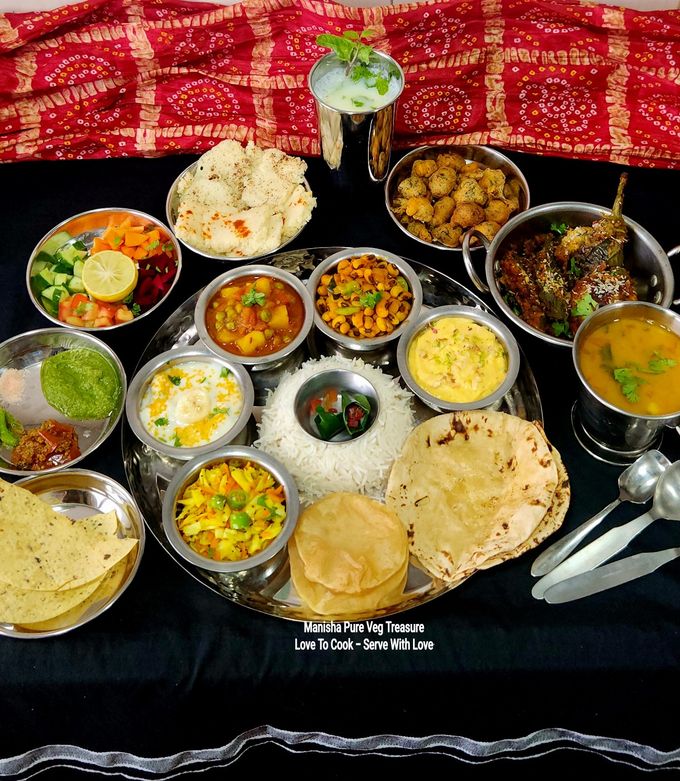 A picture of Traditional Gujarati Satvik Lunch Thali (Festive and Complete Meal) - Garvi Gujarat.