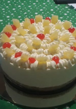 Una foto de Cheesecake de ananá y coco