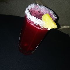 A picture of Beetroot /watermelon/pineapple drink.