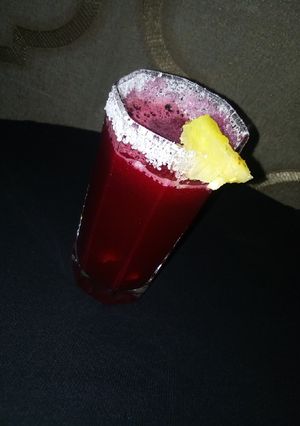 A picture of Beetroot /watermelon/pineapple drink.