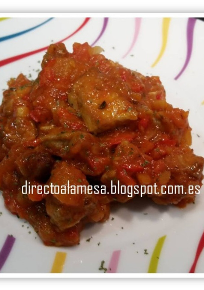 Una foto de Magro de cerdo con tomate casero