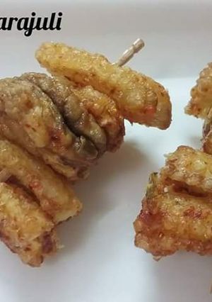 A picture of Babycorn and mushroom fritters.