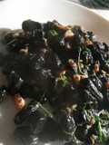 Gnocchetti al nero di seppia con burro, salmone e rucola